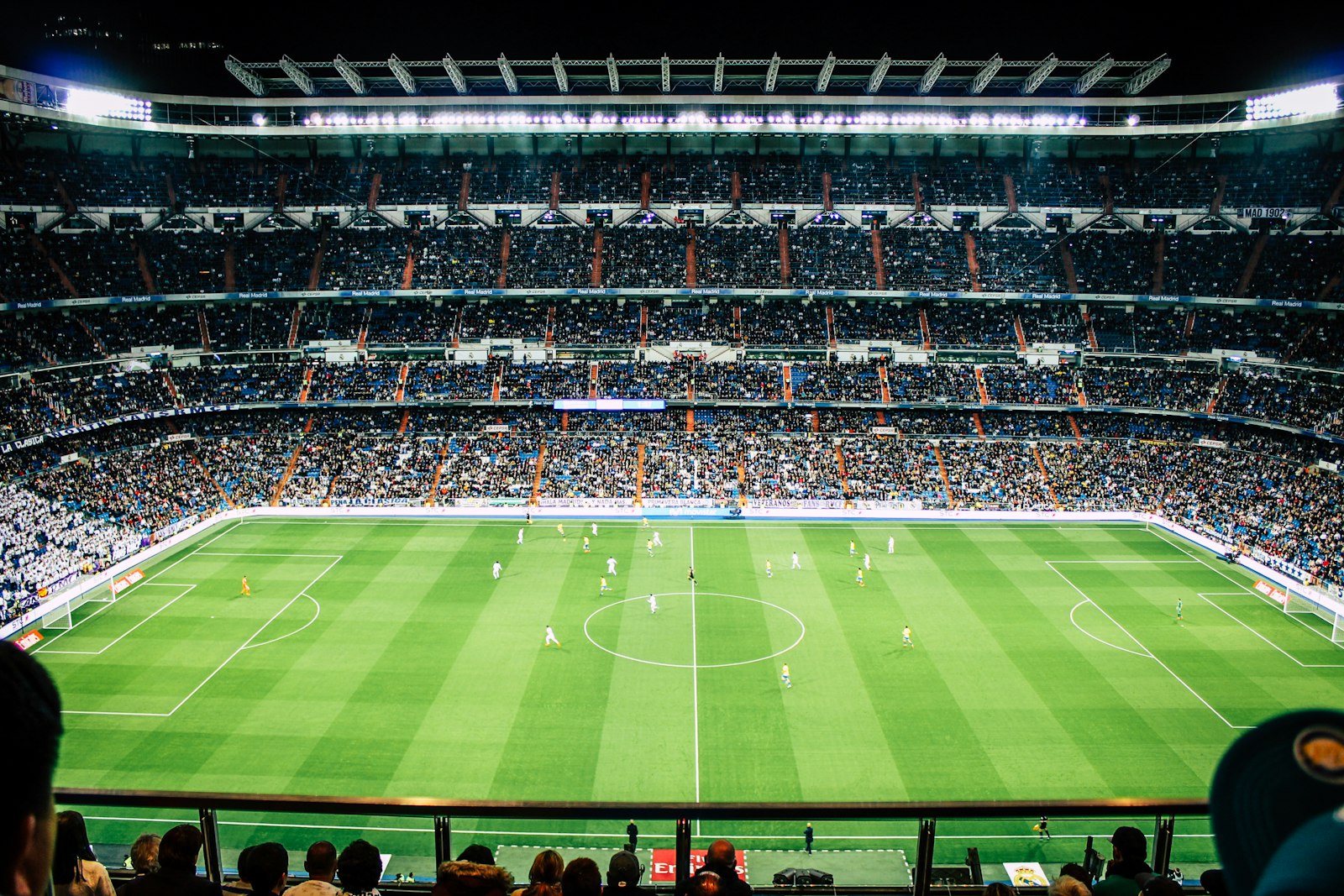 World-class football stadium packed with fans under dramatic lights - The Luxury Travelers Ultimate Guide to the 2026 FIFA World Cup