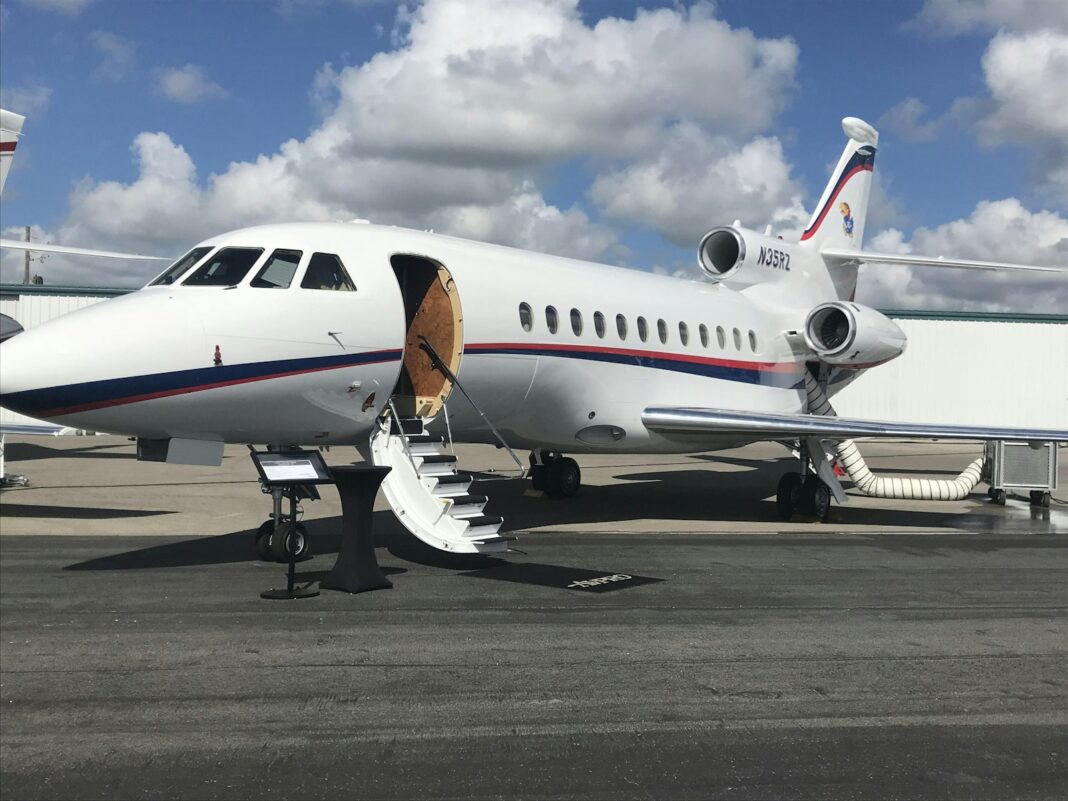 Best Private Jet Charter Companies 2026: The 10 Top Operators for Luxury Travel Luxury private jet on tarmac at sunset for luxury travel