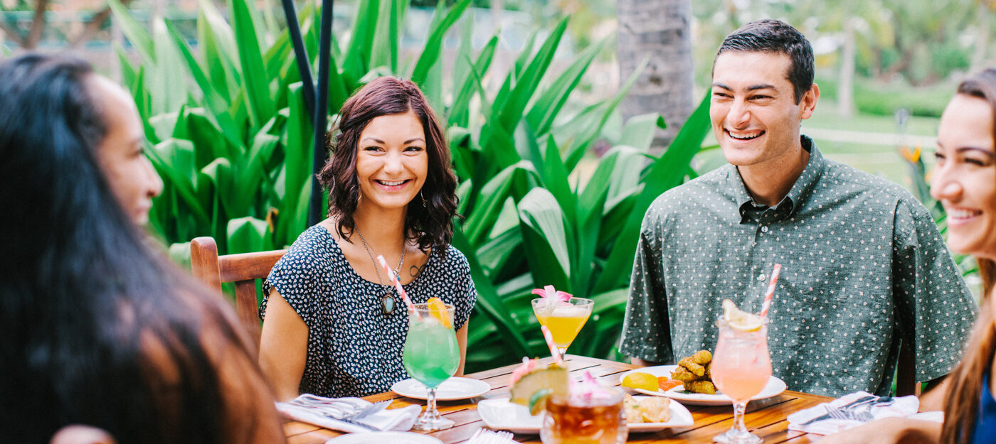 Dining with cocktails and appetizers at Duke's Beach House Maui